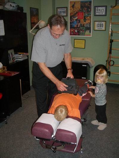 Dr. Mike Cain performing adjustment